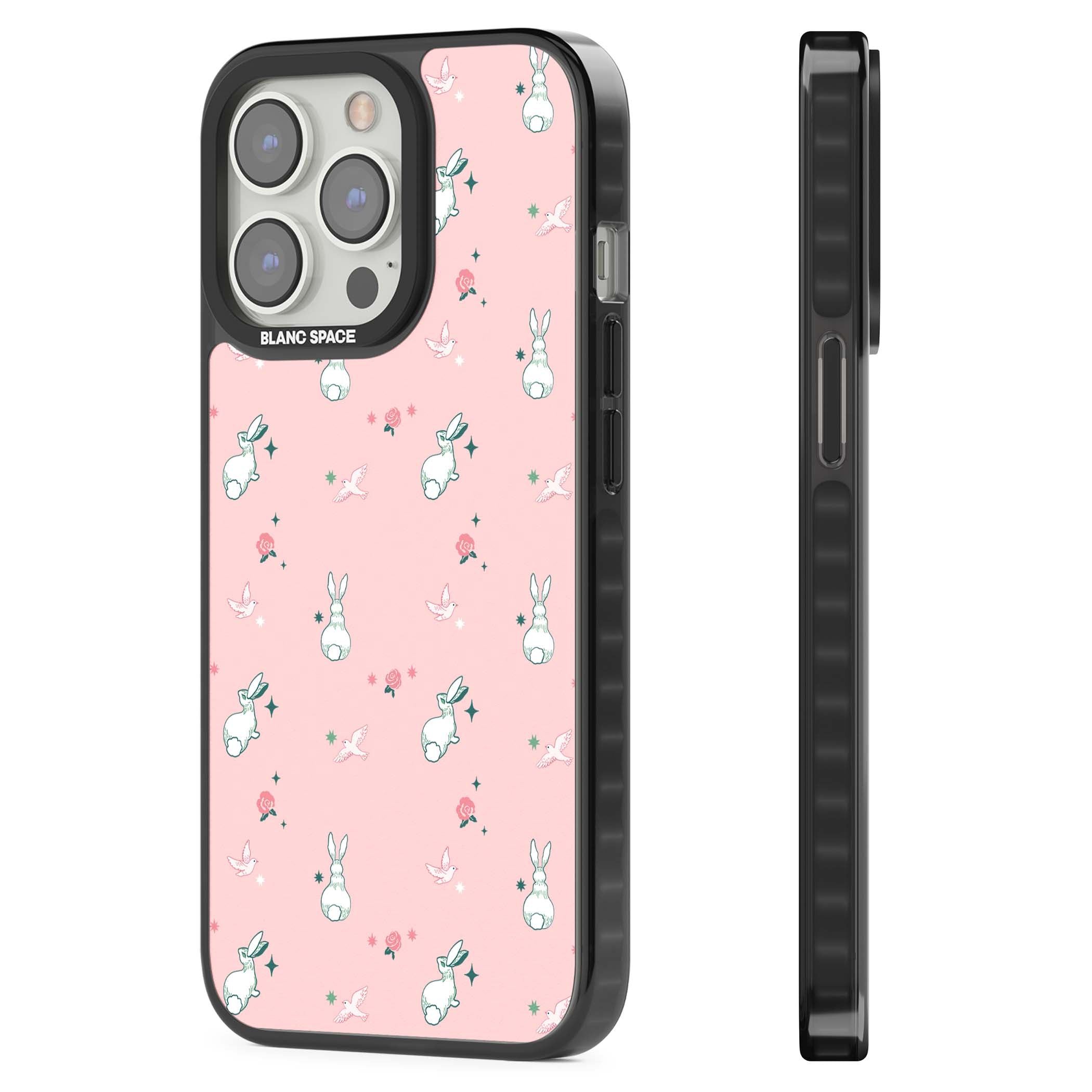 Bunny Garden kawaii iPhone case featuring white rabbits, pink roses, doves and stars on pink background | Black Impact case for iPhone 13 Pro, iPhone 14 Pro, iPhone 15 Pro