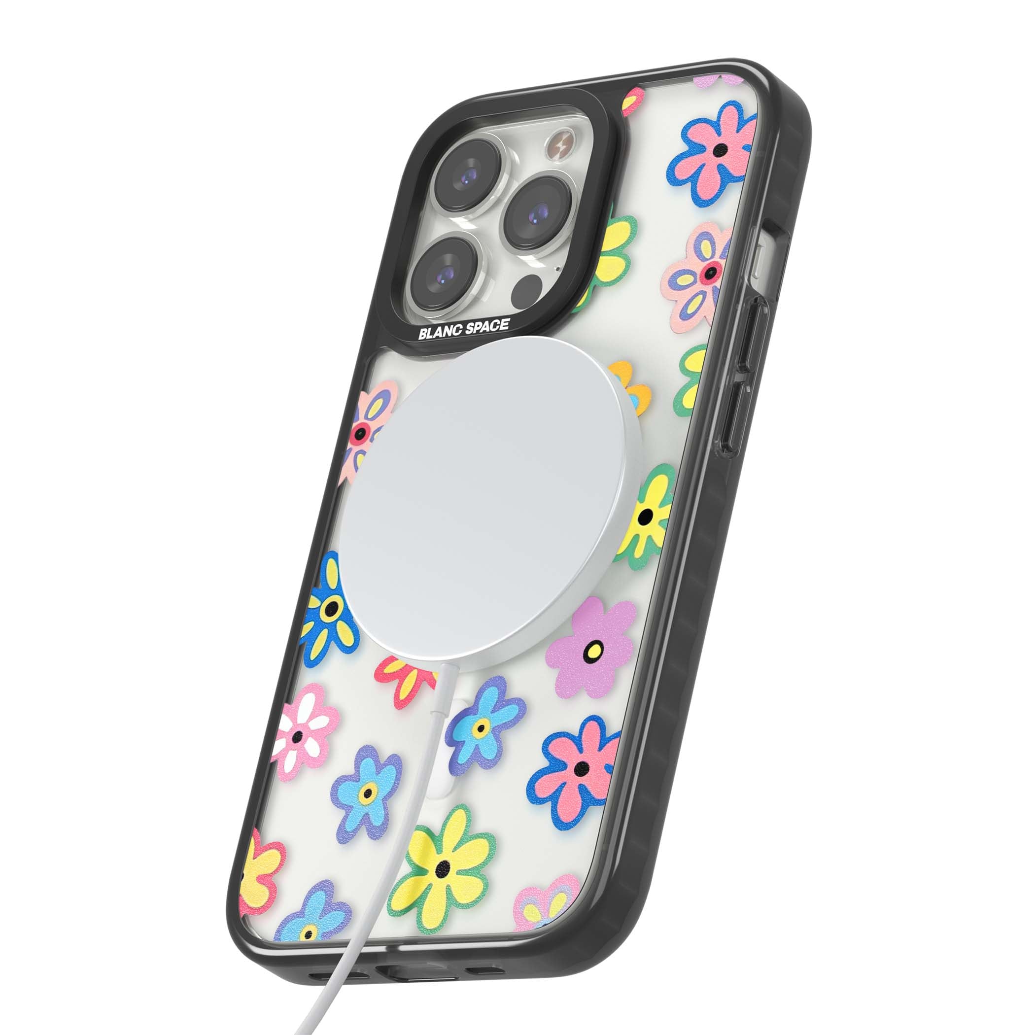 Bloom Pop cottagecore iPhone case featuring multicolor pastel flowers with black centers on clear background | Black Impact Magsafe case for iPhone 13 Pro, iPhone 14 Pro, iPhone 15 Pro