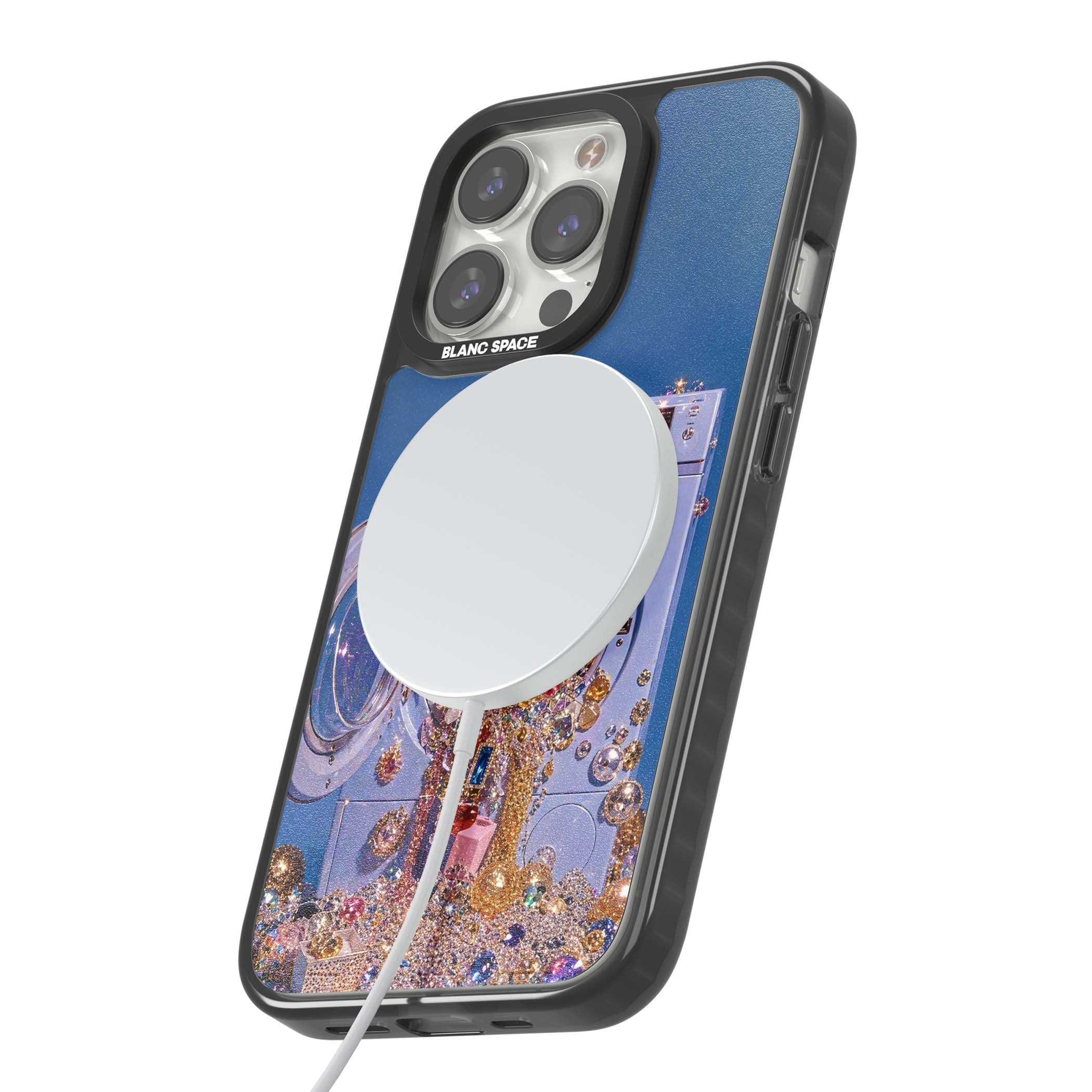 Gem Laundry baddie iPhone case featuring a surreal washing machine overflowing with colourful gemstones and crystals | Black Impact Magsafe case for iPhone 13 Pro, iPhone 14 Pro, iPhone 15 Pro