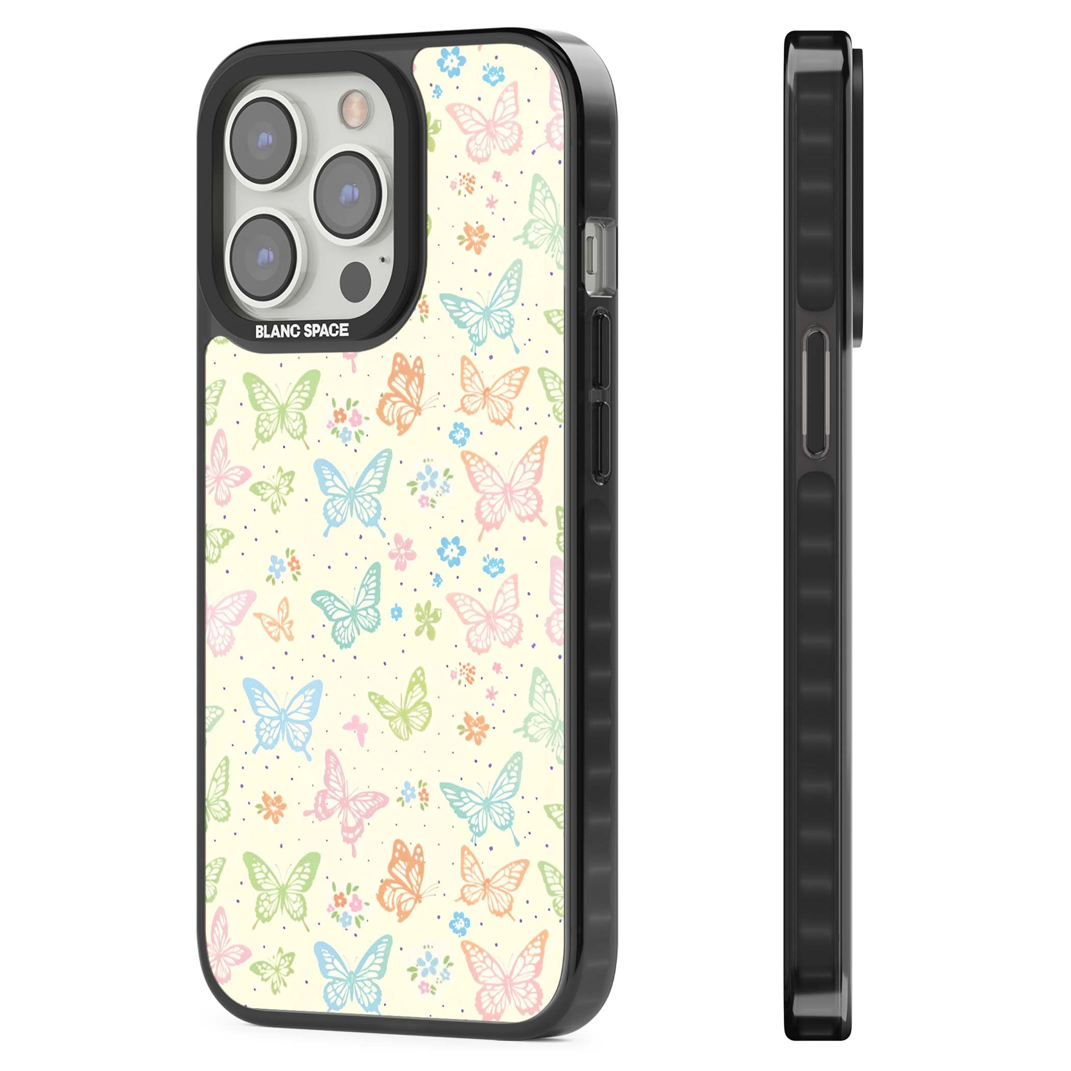 Sugar Wings cottagecore iPhone case featuring rainbow pastel butterflies, tiny wildflowers, and a cream background | Black Impact Magsafe case for iPhone 13 Pro, iPhone 14 Pro, iPhone 15 Pro