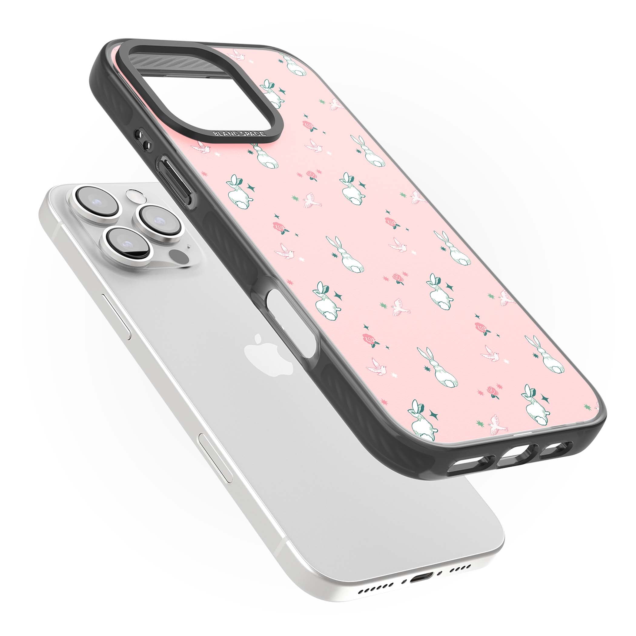 Bunny Garden kawaii iPhone case featuring white rabbits, pink roses, doves and stars on pink background | Black Impact case for iPhone 16 Pro, iPhone 16 Pro Max