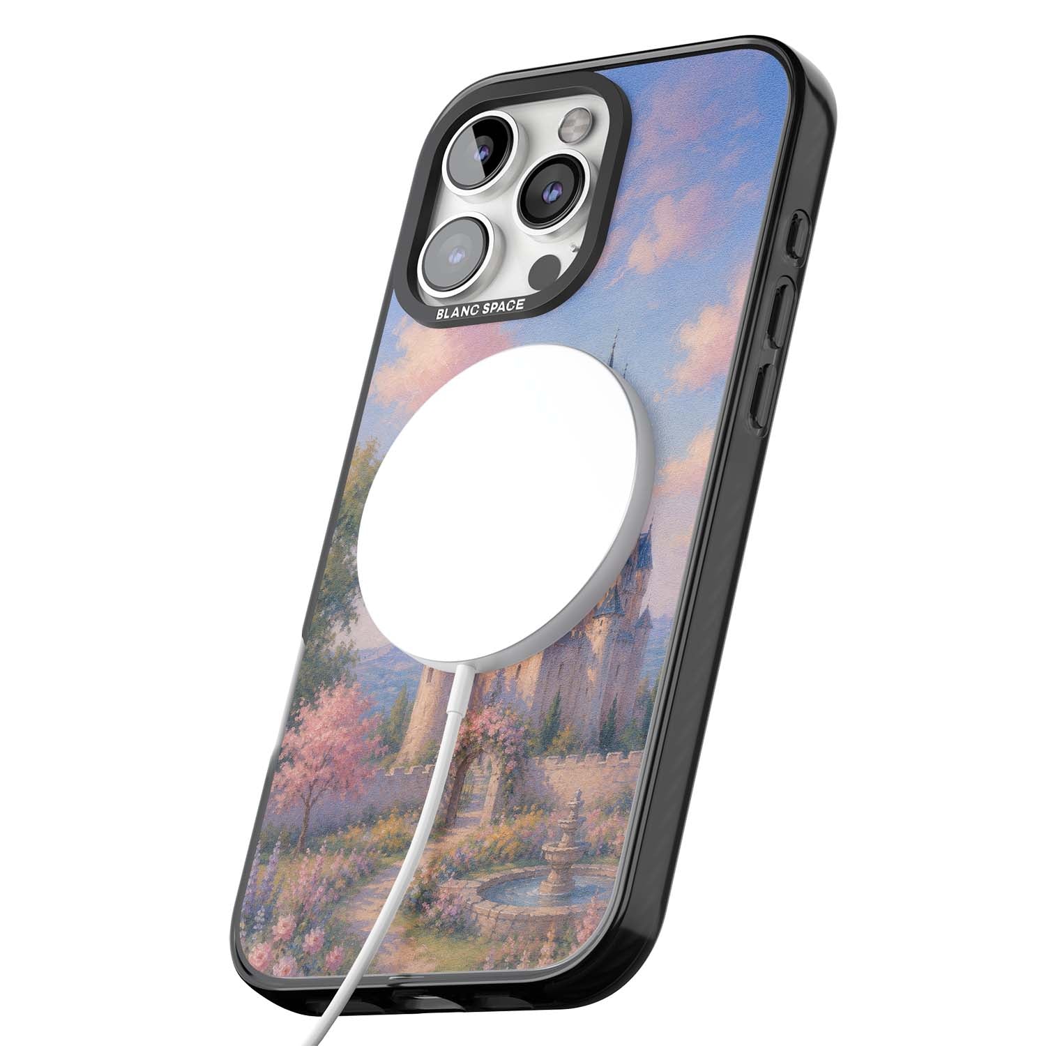 Enchanted Kingdom fairytale iPhone case featuring a romantic castle painting with cherry blossoms and pastel pink sky | Black Impact Magsafe case for iPhone 16 Pro, iPhone 16 Pro Max