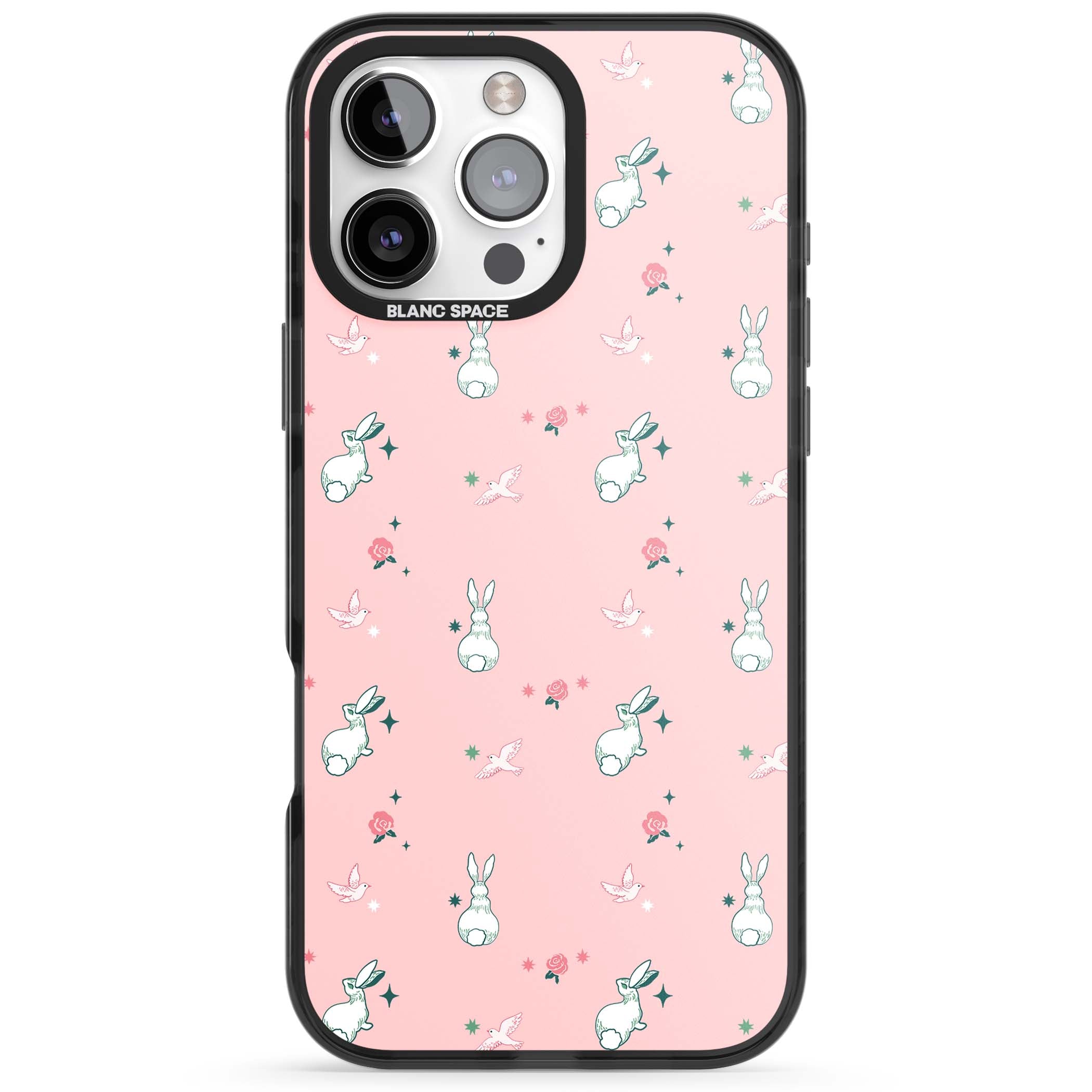 Bunny Garden kawaii iPhone case featuring white rabbits, pink roses, doves and stars on pink background | Black Impact Magsafe case for iPhone 16 Pro, iPhone 16 Pro Max