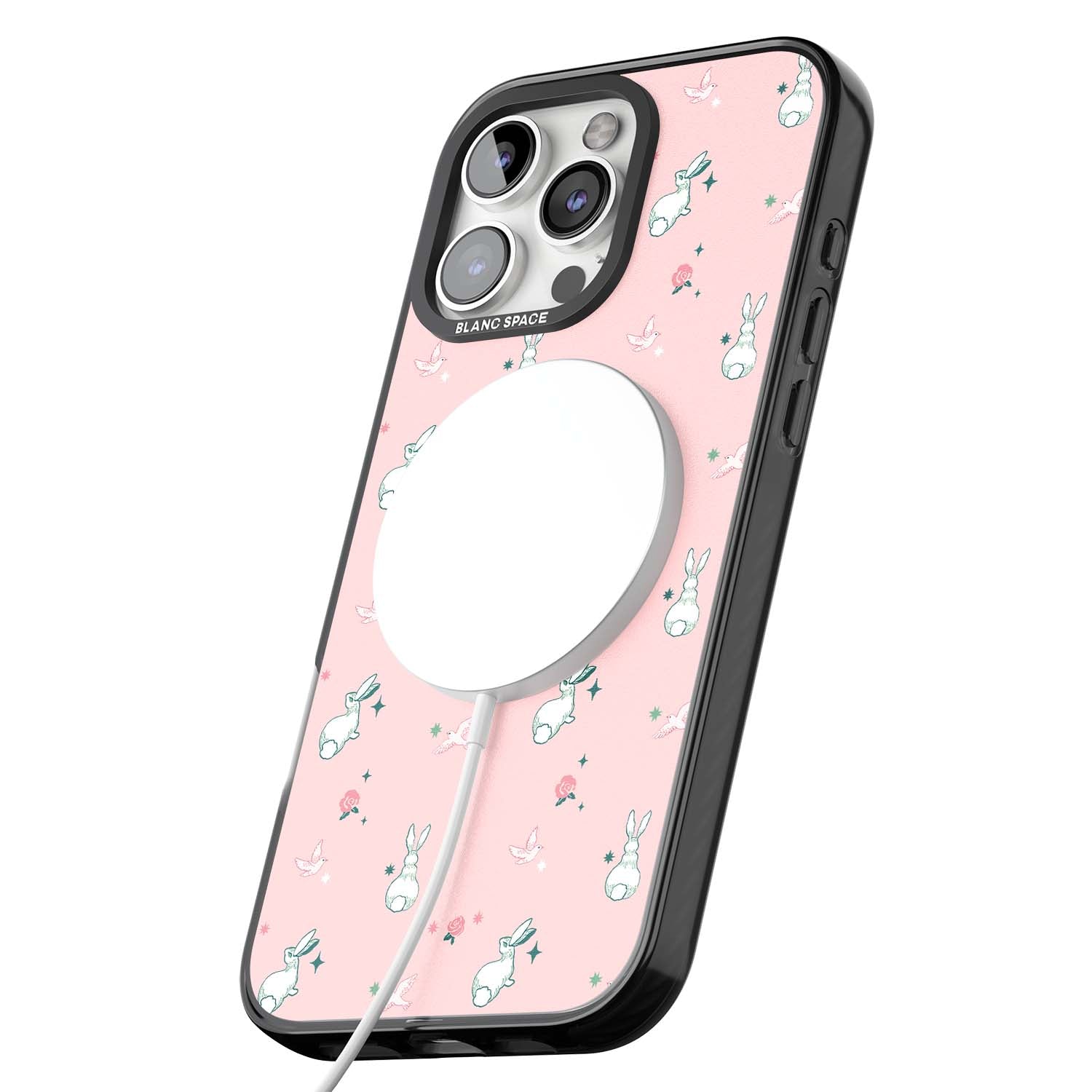 Bunny Garden kawaii iPhone case featuring white rabbits, pink roses, doves and stars on pink background | Black Impact Magsafe case for iPhone 16 Pro, iPhone 16 Pro Max
