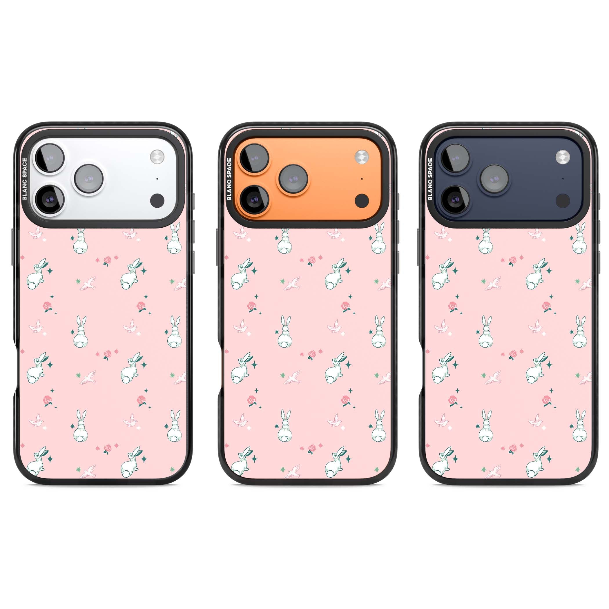 Bunny Garden kawaii iPhone case featuring white rabbits, pink roses, doves and stars on pink background | Black Impact Magsafe case for iPhone 17 Pro, iPhone 17 Pro Max