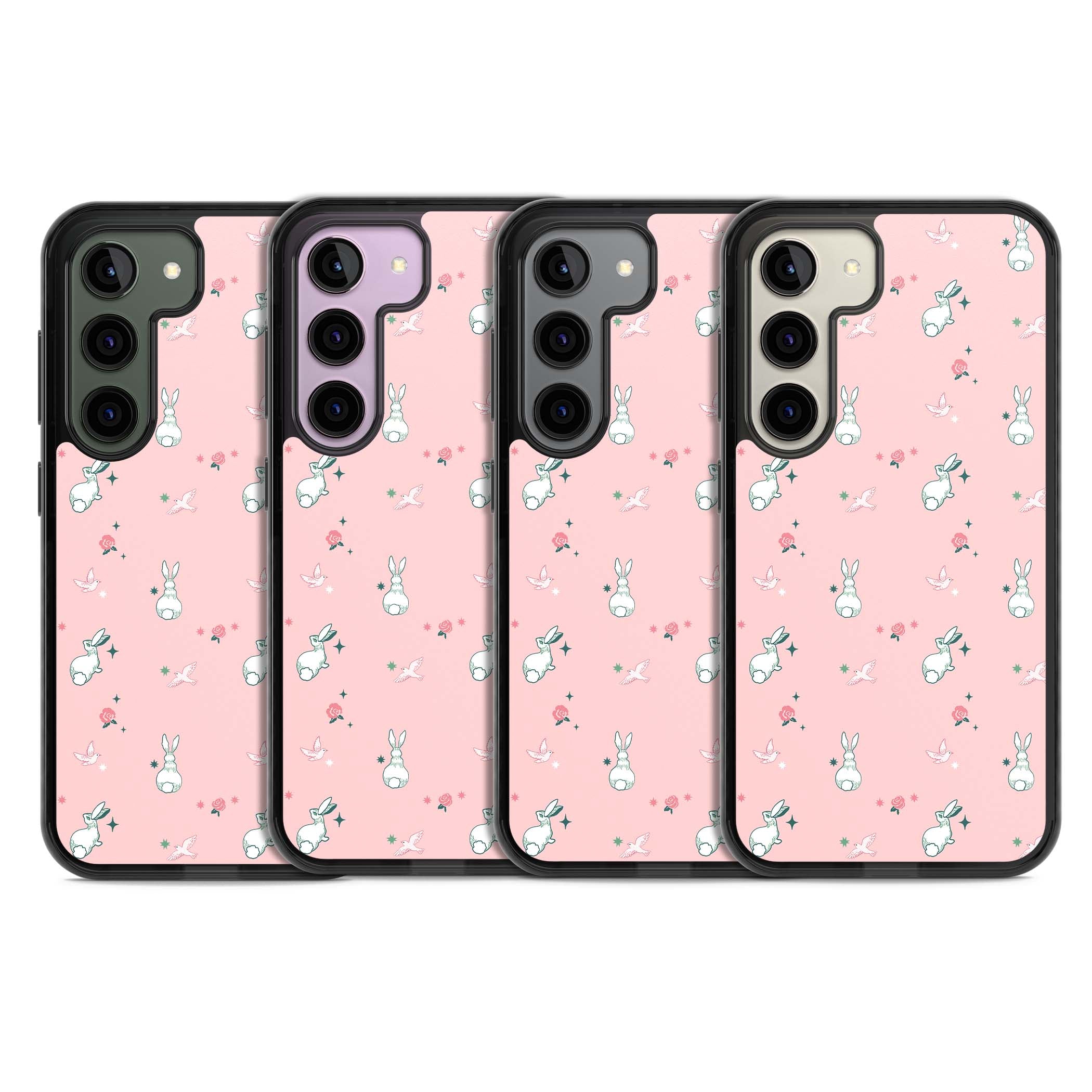 Bunny Garden kawaii iPhone case featuring white rabbits, pink roses, doves and stars on pink background | Black Impact case for Samsung Galaxy S24, Samsung Galaxy S23, Samsung Galaxy S22